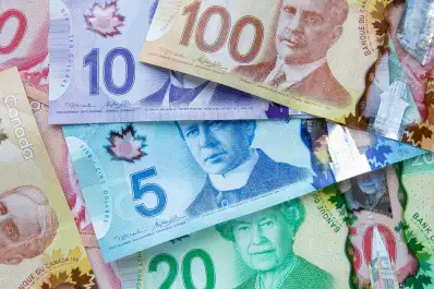 Canadian banknotes in denominations of 5, 10, 20, and 100 dollars